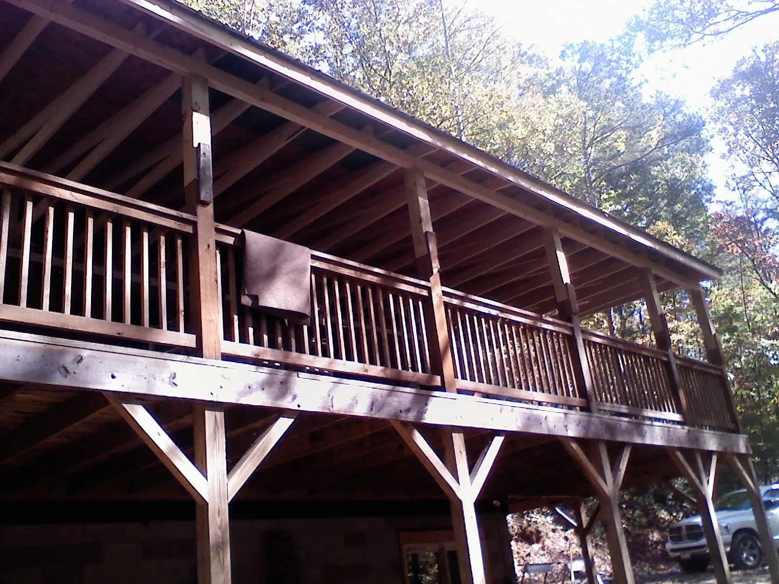 Timber framing under a new elevated porch and deck — Roof Leak Repair in Johnston by Roofing Brothers